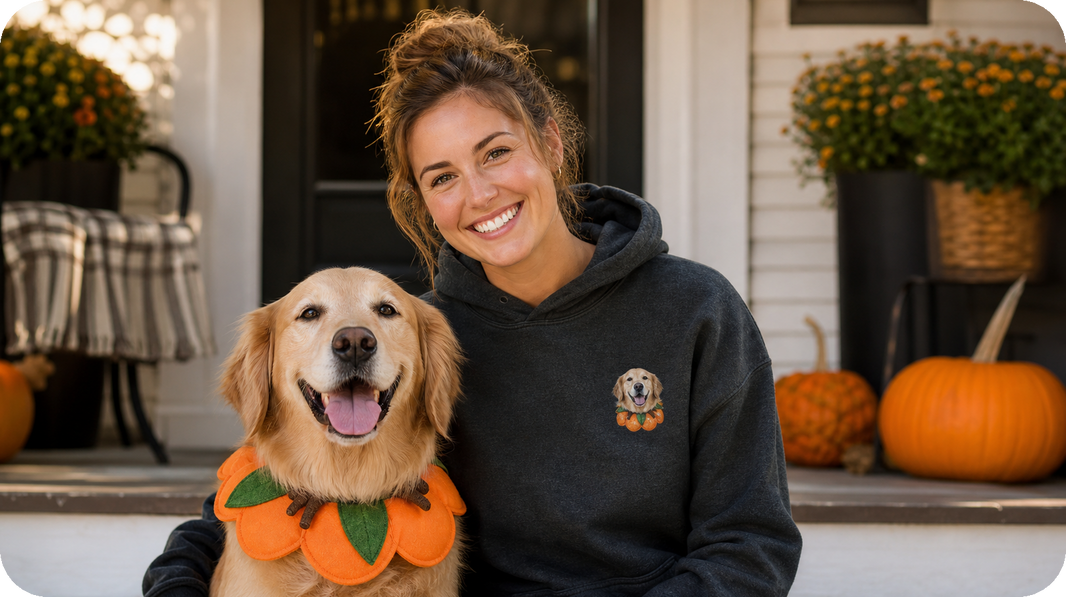 Pet owner in a left-chest Halloween pet photo embroidered hoodie beside a costumed dog