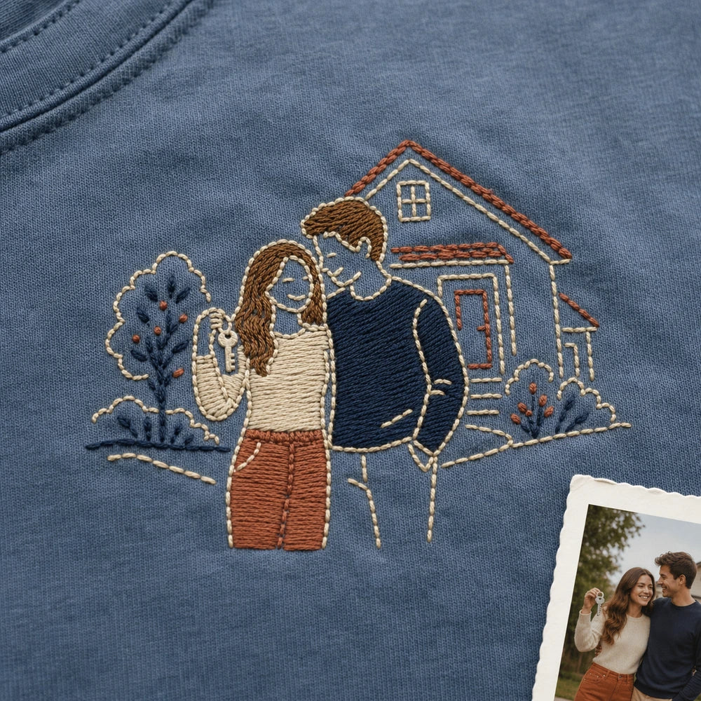 Custom First Home Couple Photo Embroidered T-Shirt - Personalized Housewarming Gift embroidery detail image with custom left chest embroidery based on couple standing outside their first home with keys