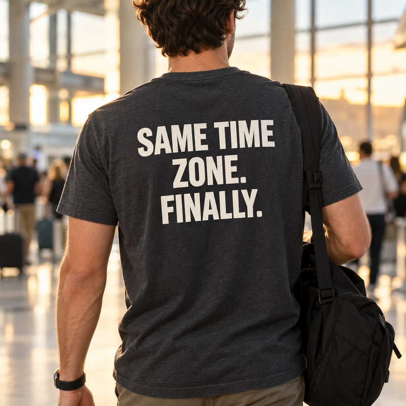 Custom Long Distance Couple Reunion Outline Embroidered T-Shirt with Back Print - Relationship Gift back worn product image with custom printed phrase with custom left chest embroidery based on couple embracing at an airport or train station reunion
