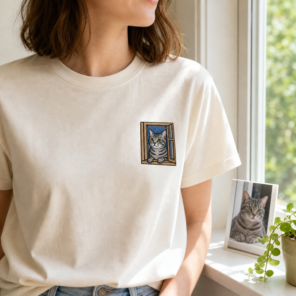 Custom cat window portrait embroidered T-shirt lifestyle image with left chest embroidery
